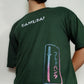 Close-up of dark green Blade Hunter oversized t-shirt front chest samurai katana graphic and SAMURAI text