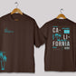 California graphic oversized t-shirt in [chocolate brown] for men and women in Pakistan with palm typography design